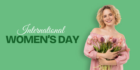 Woman holds flowers and smiles for International Women's Day