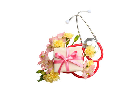 Flowers and a gift are arranged with a stethoscope, isolated, PNGの写真素材