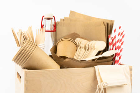 Wooden box with disposable crafted kit for food or picnic delivery Cups plates bamboo devicesの写真素材