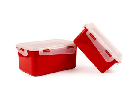 Plastic containers for food products of red color isolated on white background. Lunch boxesの写真素材