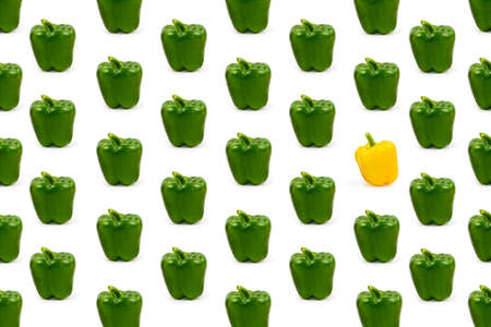 Green bell peppers with one yellow pepper pattern with white background