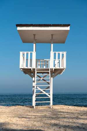 Empty observation tower on the beach in sunny weather. Vertical photoの写真素材