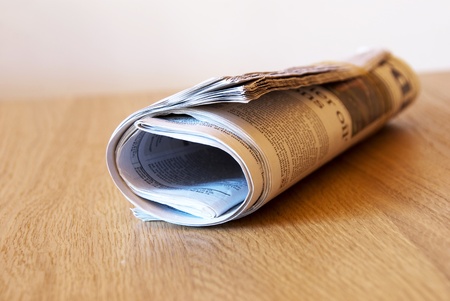Rolled newspapers