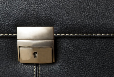 A black leather bag - the buckle - detailの写真素材