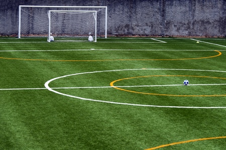 soccer field with ball at the center of the fieldの写真素材