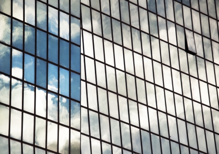 a building mirror glass wall with sky reflectionのeditorial素材