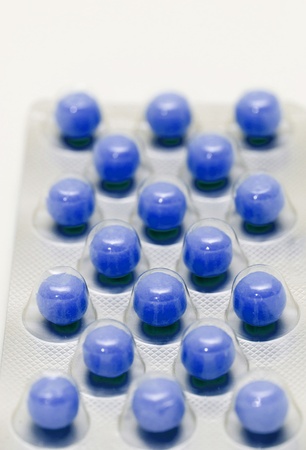 Blue  pills in a blisterの写真素材