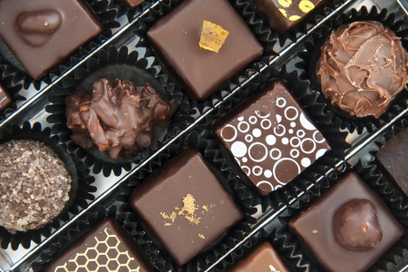 A box of various chocolate pralines - the photo is taken above