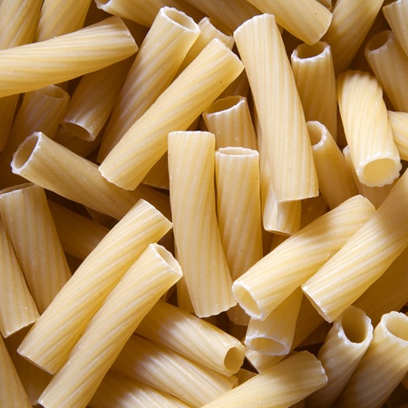 Italian pasta as food background or texture close - macaroniの写真素材