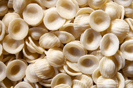 Italian pasta as food background or texture close - orecchietteの写真素材