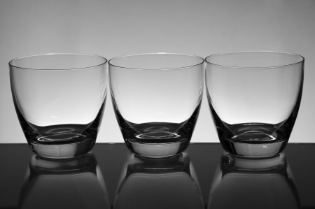 Empty water glasses in black and whiteの写真素材