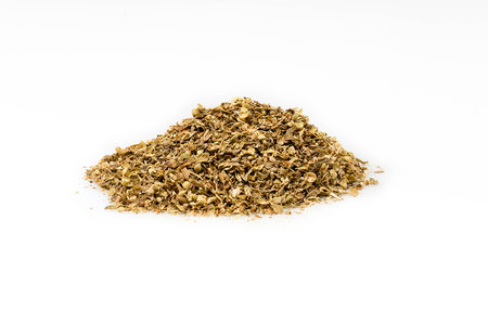 a pile of dried oregano isolated on white の写真素材