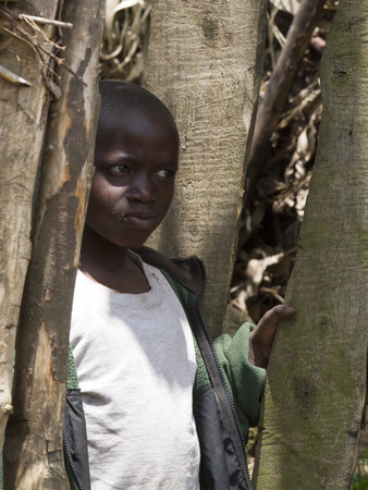 MAYANGE; RWANDA - NOVEMBER 13: Unidentified child from the UN Millenium village at November 13; 2013. It is a village of returnees-who came back to Rwanda after the 1994 genocide.のeditorial素材