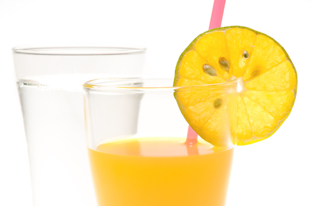 Fresh orange and glass with juiceの写真素材
