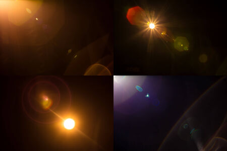 Set of 4 Retro Lomography camera lens flare effect on a black background from a stage spotlightの写真素材