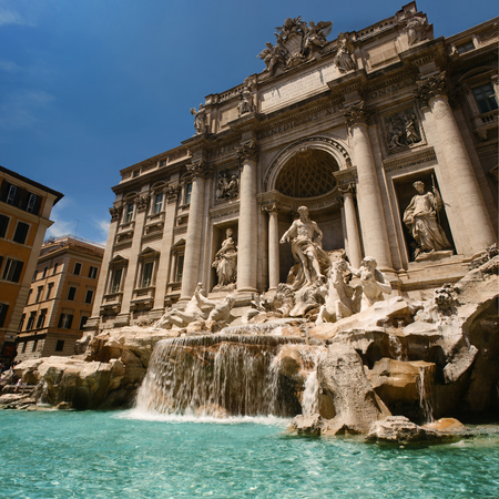 Fontaine de Trevi from low angle near water surface during sunny dayのeditorial素材