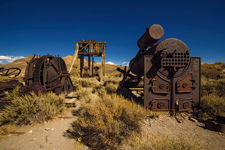 Old gold mine machines and tools abandoned in Bodie Ghost Town, California, USAのeditorial素材