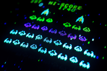 Detail on a screen game play of an old arcade video gameの写真素材