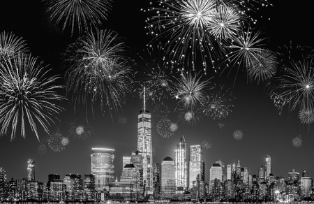 New York City Skyline with Flashing Fireworks - A night long exposure of New Years Eve Celebrationの写真素材