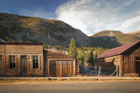 Old Western Wooden Buildings in St. Elmo Gold Mine Ghost Town in Colorado, USA hidden in mountains