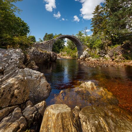 Old Pack Horse Bridge in Dulnain Bridge, Carrbridge, Scotland, UKの写真素材