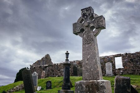 Old Viking Cross near abandoned Old Church of Kilchrist (Cill Chriosd) in Broadford, Isle of Skye, Scotland, UKの写真素材