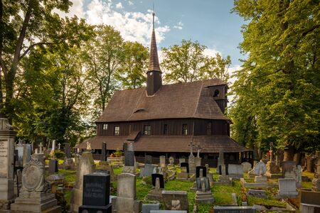 Church of the Virgin Mary in Broumov during beautiful sunny day with blues sky âÂ The oldest wooden church in  Czech Republic and second oldest in Europeの写真素材