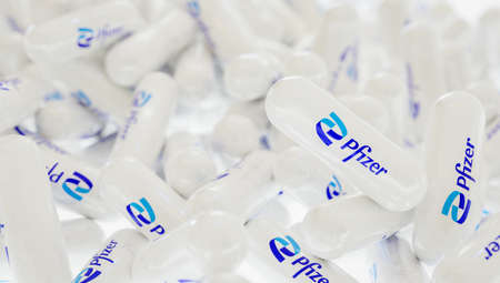 Prague, Czech Republic - January 2, 2022: Pfizer Paxlovid Covid-19 Oral Antiviral Treatment Pills 3D Product Visualization Renderのeditorial素材
