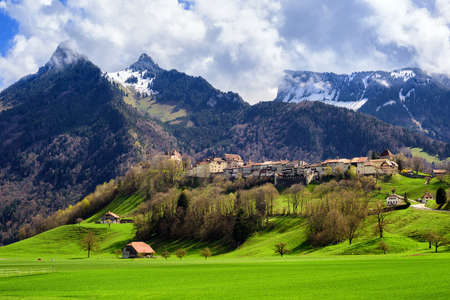 Gruyeres town, known for his world famous Gruyere cheese, laying on a hill in the Alps mountains, Switzerlandのeditorial素材