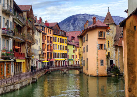 Medieval old town and the tower of Palais de l'Isle castle on Thiou river in Annecy, Savoy, Franceのeditorial素材