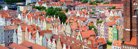 Panoramic view of colorful gothic houses with red tiled roofs in the old town of Gdansk, Poland