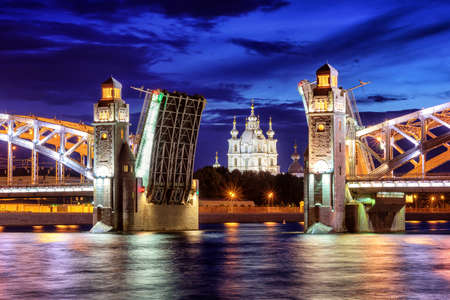 Peter the Great Bridge and Smolny Cathedral at summer white night time, St Petersburg, Russiaの写真素材
