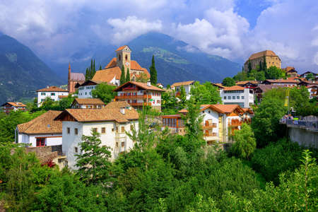 Panoramic view of the alpine village Schenna by Merano in South Tyrol, Italy, with Maria's Church and the Castleのeditorial素材
