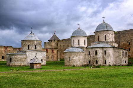 Russian orthodox churches inside the walls of Ivangorod Fortress on Russia - Estonia border on a...