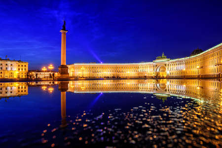 General Staff building and Alexander Column reflecting in rain water on Palace Square in St Petersburg, Russia, on white summer nightのeditorial素材