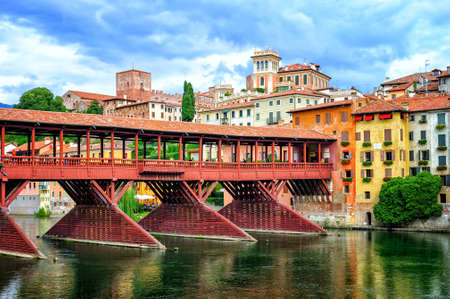 Famous wooden bridge Ponte degli Alpini over river Brenta in Bassano del Grappa, a little town in Veneto, Italyのeditorial素材