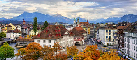 Panoramic view of the Old Town of Lucerne with Alps mountains in background, Switzerlandの写真素材