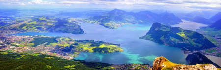 Panoramic view of Lake Lucerne with Lucerne town, Kussnacht, Burgenstock resort and Rigi Mountain, swiss Alps mountains, Switzerlandの写真素材