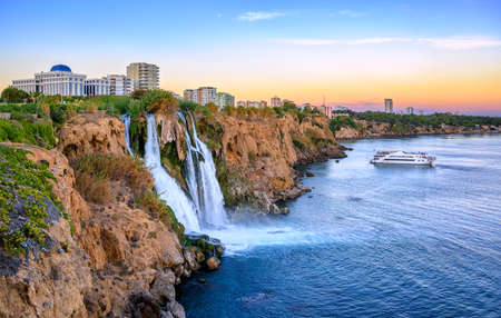 Lower Duden waterfalls on Mediterranean sea coast, Antalya, Turkey, in sunset lightの写真素材