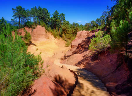 The Ochre Path (le Sentier des Ocres) through the Red Cliffs of Roussillon (Les Ocres), a nature...
