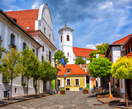 Szentendre, a medieval Old town in Hungary, view of the Town Hall and Peter and Paul church.. Szentendre is a popular tourist destination for a one day trip from Budapest.の写真素材