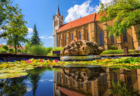 Keszthely city, Hungary, a popular resort on lake Balaton, view of the historical Old town, central square and the Our Lady of Hungary church on a beautiful summer dayの写真素材