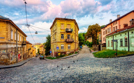Lviv, Ukraine - 29 July 2019: Colorful houses in a typical street in the Old town of Lviv, Ukraine....
