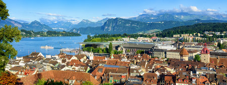 Panoramic view of Lucerne Old town, Lake Lucerne and swiss Alps mountains on a sunny summer day,...