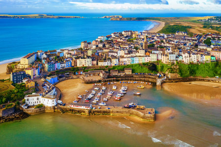 The port and the sand beaches in the Old town of Tenby, a popular resort town famous for its colorful traditional houses and sand beaches in Pembrokeshire, Wales, United Kingdomの写真素材
