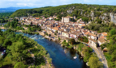 Historical Vogue town, dramatically located in a gorge of Ardeche river, is one of the most beautiful villages of France and a popular travel destination in Ardeche regionの写真素材