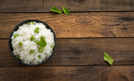 rice with string bean on woodの写真素材