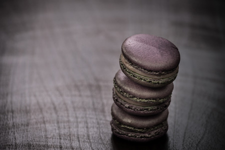 dark macaroon on woodの写真素材