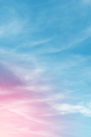 Sun and cloud background with a pastel colored