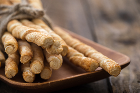 Pie or bread Sticks with rope sack on wood